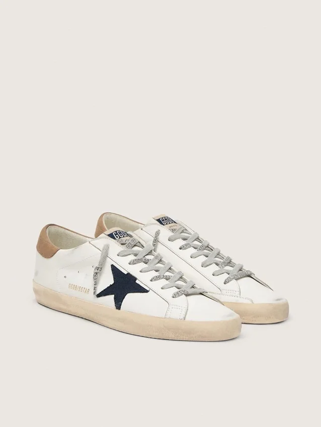 Men's Super-Star in white leather with midnight-blue canvas star and tobacco leather heel tab
