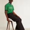 Men's Super-Star in white leather with midnight-blue canvas star and tobacco leather heel tab