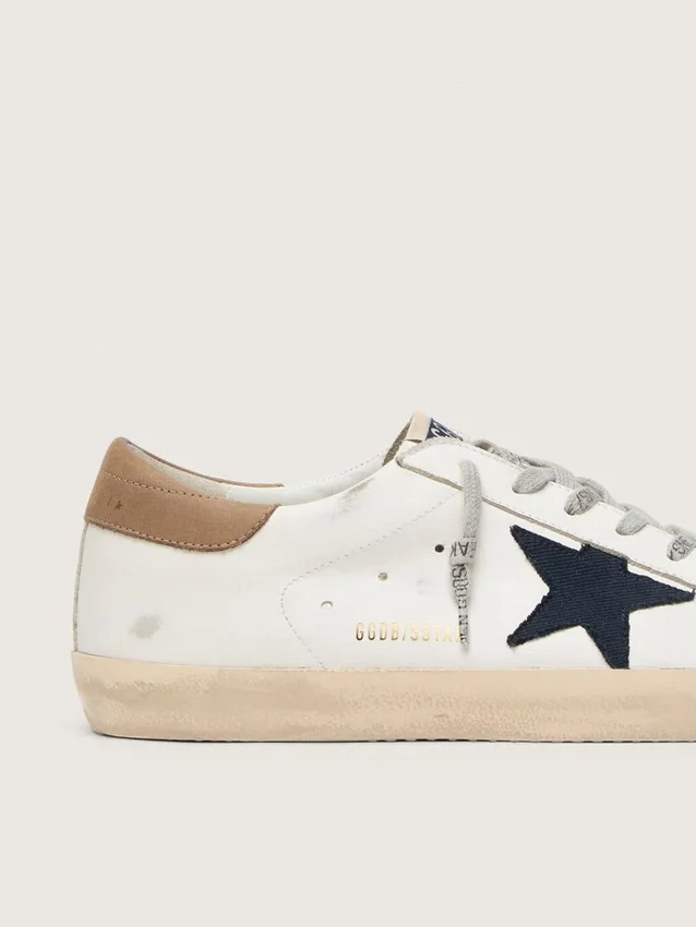 Men's Super-Star in white leather with midnight-blue canvas star and tobacco leather heel tab