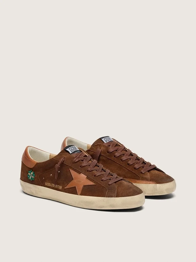 Men’s Super-Star LTD in brown suede with brick-red leather star and embroidery with green beads