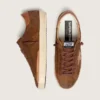 Men’s Super-Star LTD in brown suede with brick-red leather star and embroidery with green beads