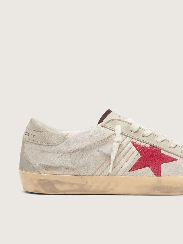 Men’s Super-Star LTD in white pony skin with red suede star