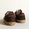 Men's Super-Star Penstar in brown suede with a platinum star