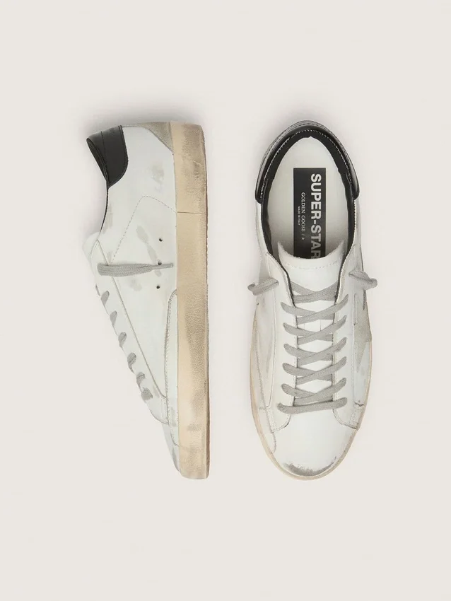 Men's Super-Star with black heel tab and metal stud lettering