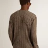 Men's travertine-colored sweater with 'Golden' patch lettering on the back