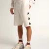 Men's vintage white bermuda shorts with contrasting black stars