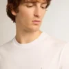 Men's white T-shirt with silver glitter star on the front