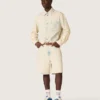 Men's Bermuda shorts in light sand-colored denim