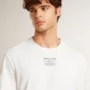 Men's worn-white cotton T-shirt with black lettering