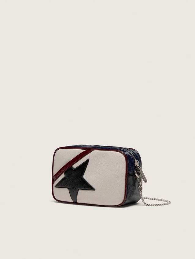 Mini Star Bag in butter-white leather with black star and burgundy and dark blue details