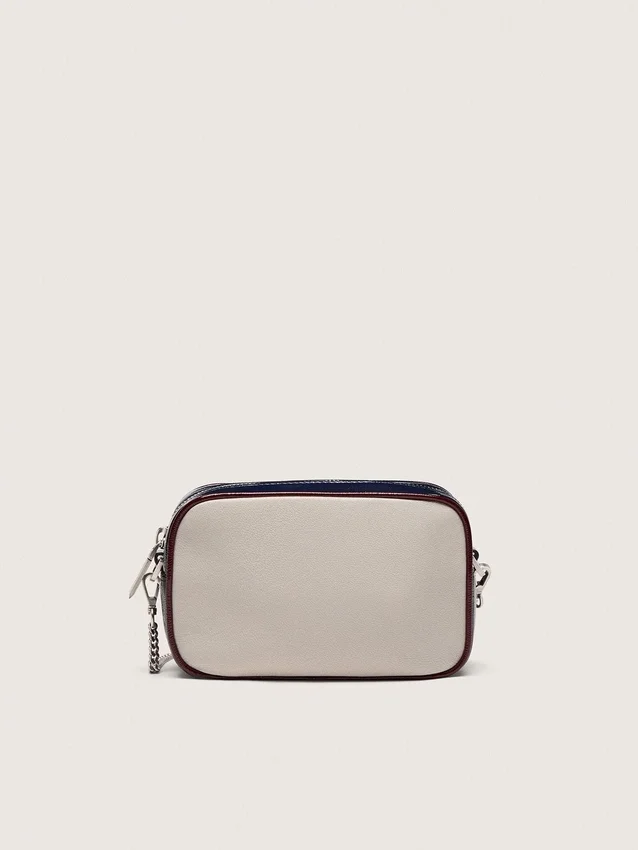 Mini Star Bag in butter-white leather with black star and burgundy and dark blue details