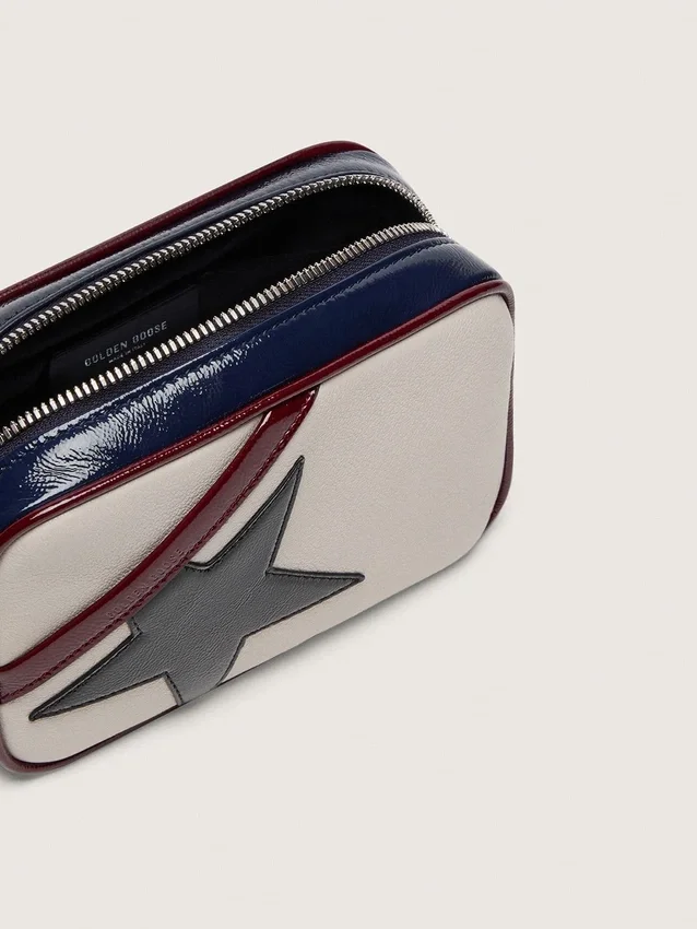 Mini Star Bag in butter-white leather with black star and burgundy and dark blue details