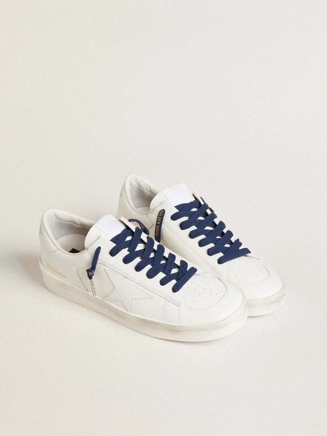 Navy blue cotton laces with contrasting gold logo