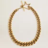 Necklace in antique gold decreasing chain with star-shaped clasp