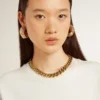 Necklace in antique gold decreasing chain with star-shaped clasp