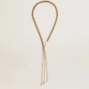 Necklace with antique gold-colored chains with pearls