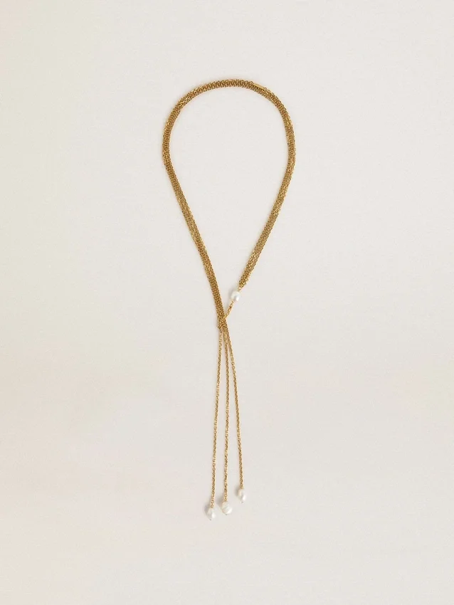 Necklace with antique gold-colored chains with pearls