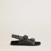 Noa Junior sandals in distressed black leather