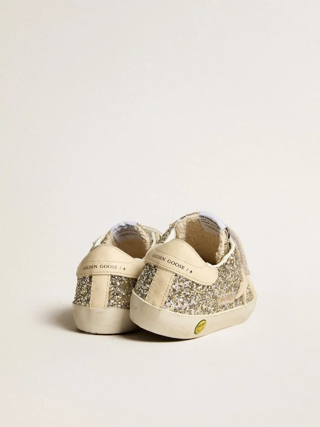 Old School Junior in platinum glitter with leather star and heel tab