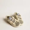 Old School Young in platinum glitter with leather star and heel tab