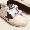 Old School Young in white leather with blue suede star and heel tab