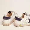 Old School Young in white leather with blue suede star and heel tab