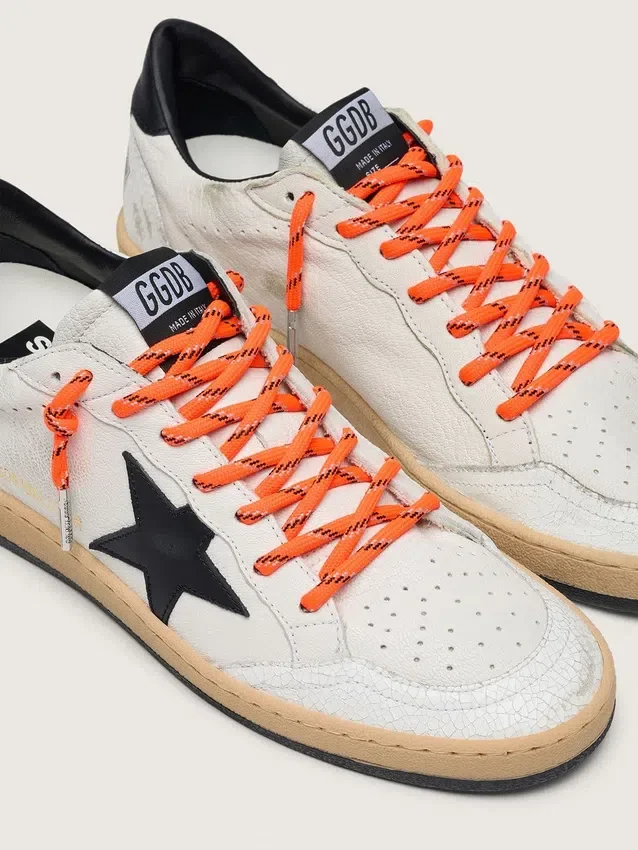 Orange hiking laces with gray and black details