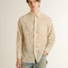 Oversized shirt in cream-colored see-through lace