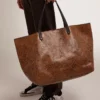 Pasadena Bag in hammered leather with leopard print and contrasting black handles