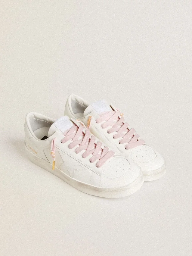 Pink cotton laces with contrasting gold-colored logo