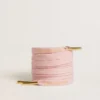 Pink cotton laces with contrasting gold logo