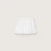 Pleated sports miniskirt in white