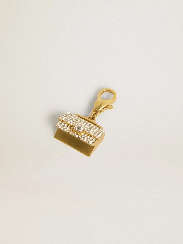 Purse-shaped charm in gold-colored brass with crystals