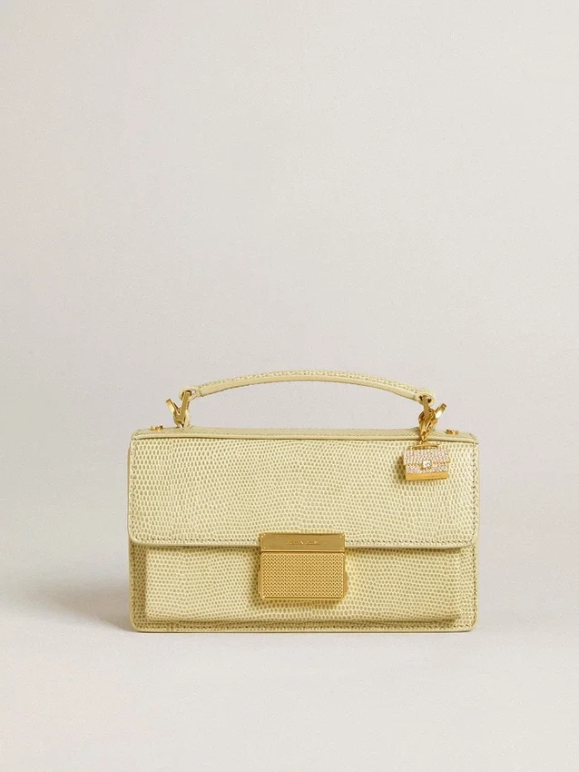 Purse-shaped charm in gold-colored brass with crystals