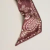 Ribbon in burgundy silk twill with paisley pattern