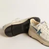 Running Sole in nappa with blue leather star and suede insert
