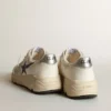 Running Sole in white leather and mesh with blue laminated leather star