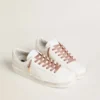 Salmon pink Lurex laces with contrasting black logo