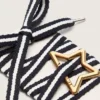 Skins black and white laces with star-shaped snap hook