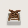 Skins brown-colored wool laces with Golden star-shaped snap hook