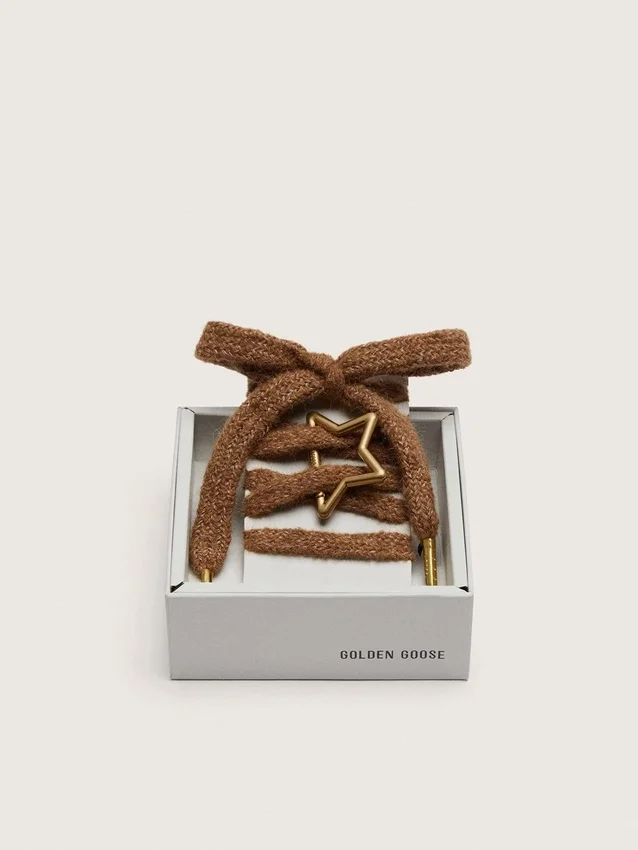 Skins brown-colored wool laces with Golden star-shaped snap hook