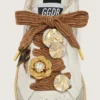 Skins burgundy and peach embroidered laces embellished with charms