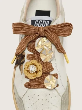 Skins burgundy and peach embroidered laces embellished with charms