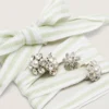 Skins green and white striped laces with jewel charms