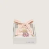 Skins light beige laces with pink braiding, pin and appliqués