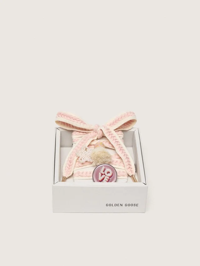 Skins light beige laces with pink braiding, pin and appliqués