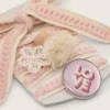 Skins light beige laces with pink braiding, pin and appliqués