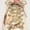 Skins metallic red-clay laces with two pins