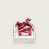 Skins red and white striped laces with charms