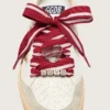 Skins red and white striped laces with charms